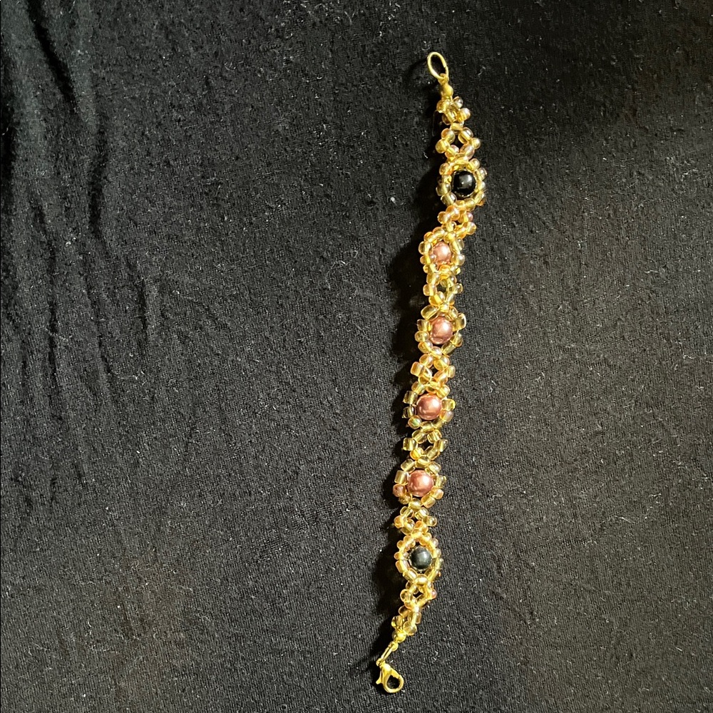 Elegant Gold and Pink Bracelet